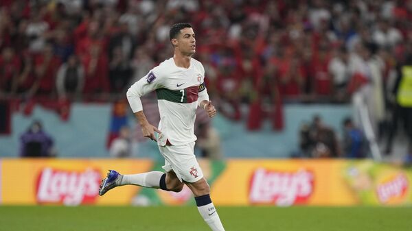 Portugal's Cristiano Ronaldo enters the pitch during the World Cup quarterfinal soccer match between Morocco and Portugal, at Al Thumama Stadium in Doha, Qatar, Saturday, Dec. 10, 2022. - Sputnik India