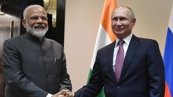 Russian President Vladimir Putin, right, and Indian Prime Minister Narendra Modi pose for a photo prior to their talks on a sideline of the Shanghai Cooperation Organization summit in Bishkek, Kyrgyzstan, June 13, 2019 - Sputnik India