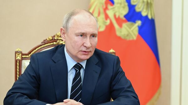 Russian President Vladimir Putin chairs a meeting with members of the Security Council via a video conference at the Kremlin in Moscow, Russia. - Sputnik India