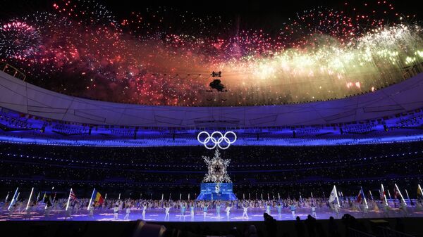 Fireworks explode during the closing ceremony of the 2022 Winter Olympics, Feb. 20, 2022, in Beijing. India has overtaken China as the world’s most populous nation and has grand ambitions of becoming a major international player but it has a long way to go to match its Asian neighbor’s clout in the sports arena. - Sputnik India