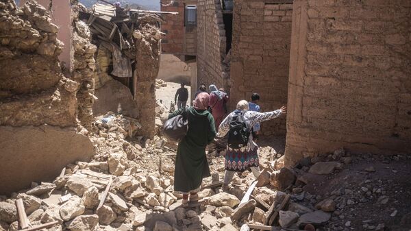 Residents flee their homes after an earthquake in Moulay Brahim village, near the epi centre of the earthquake, outside Marrakech, Morocco - Sputnik India