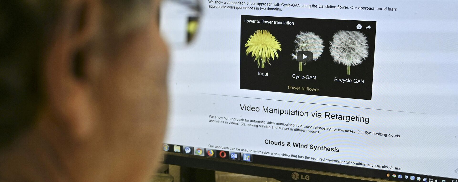 An AFP journalist views an example of a deepfake video manipulated using artificial intelligence, by Carnegie Mellon University researchers, from his desk in Washington, DC January 25, 2019. - Sputnik India, 1920, 10.04.2024
