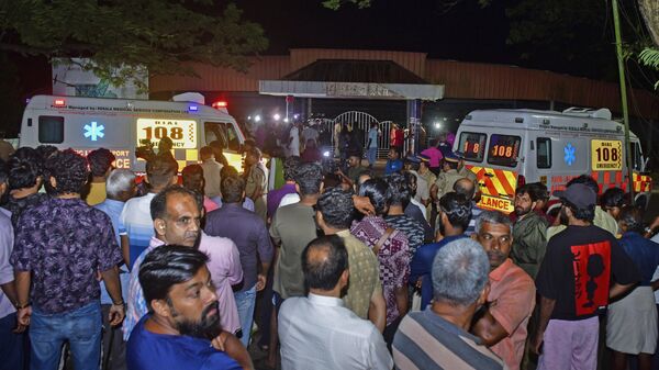 People gather outside after a stampede at the venue of a music concert at the Cochin University of Science and Technology in Kochi, Kerala state, India, Saturday, Nov.25, 2023. - Sputnik India