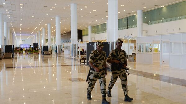 Armed Central Industrial Security Force (CISF) patrol at a new international arrival terminal, developed under an airport modernisation programme in Chennai on September 28, 2018. - Sputnik India
