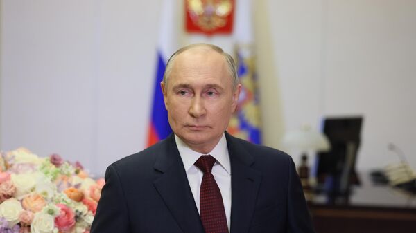 Russian President Vladimir Putin makes a video address to congratulate Russia's women on International Women's Day in Moscow, Russia - Sputnik India